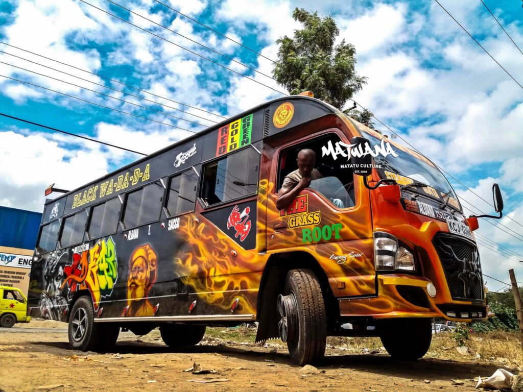 Matatu in Nairobi At Safari Kenya Holiday, we believe a true Kenyan journey starts in the city. Before you head to the silence of the Maasai Mara, experiencing the music matatu